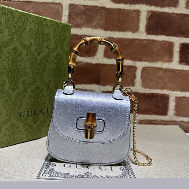 G*u*i top handle bags